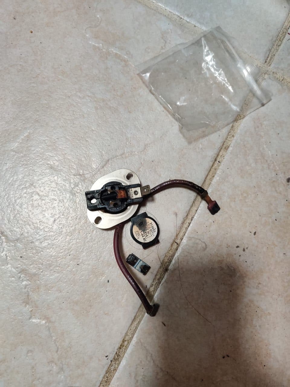 Old dryer thermal limiter: KitchenAid dryer, model KEHS01PMT1 (dryer repair in Boca Raton, FL, September 2026)