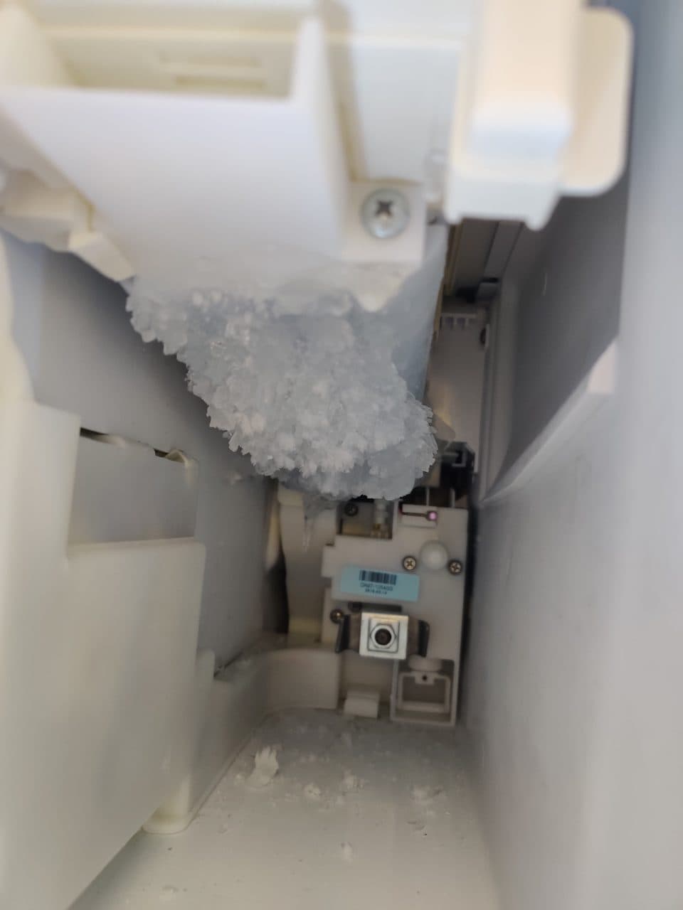 Ice buildup jamming the ice maker: Samsung refrigerator, model RF28K9380SR (refrigerator repair in Palm Beach Gardens, FL, July 2026)