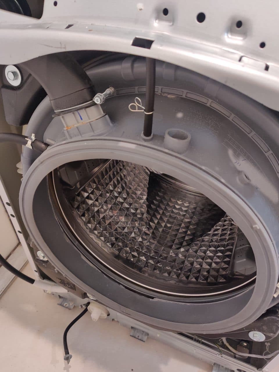 Front-load washer door seal and tub with the front panel off